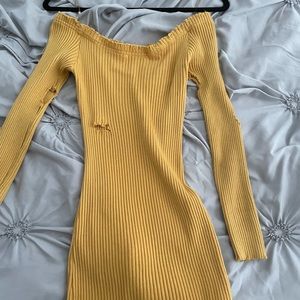Yellow distressed mini dress from Fashion Nova